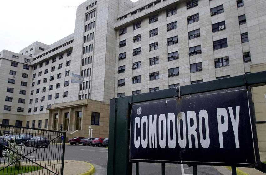 El Gobierno pule la denuncia que hará en Comodoro Py por el acuerdo de Macri con el FMI